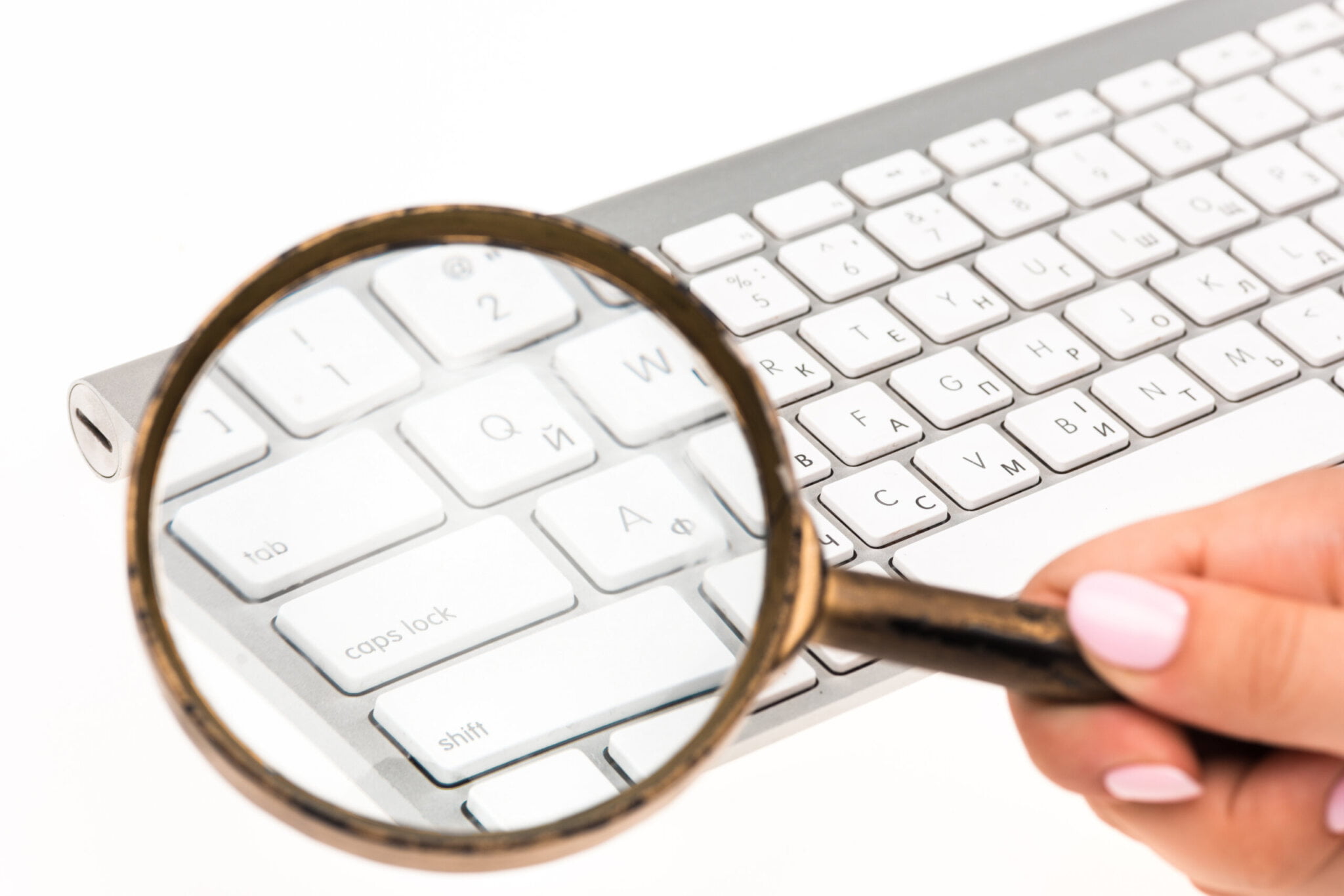 Magnifying glass over a keyboard