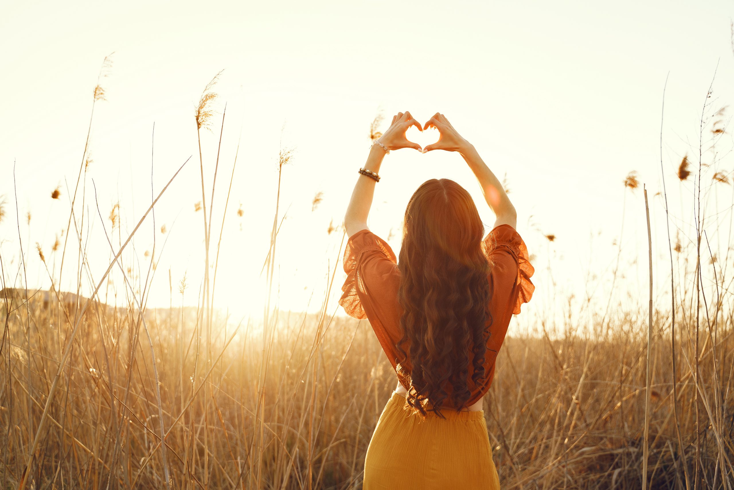 Woman in field of gold