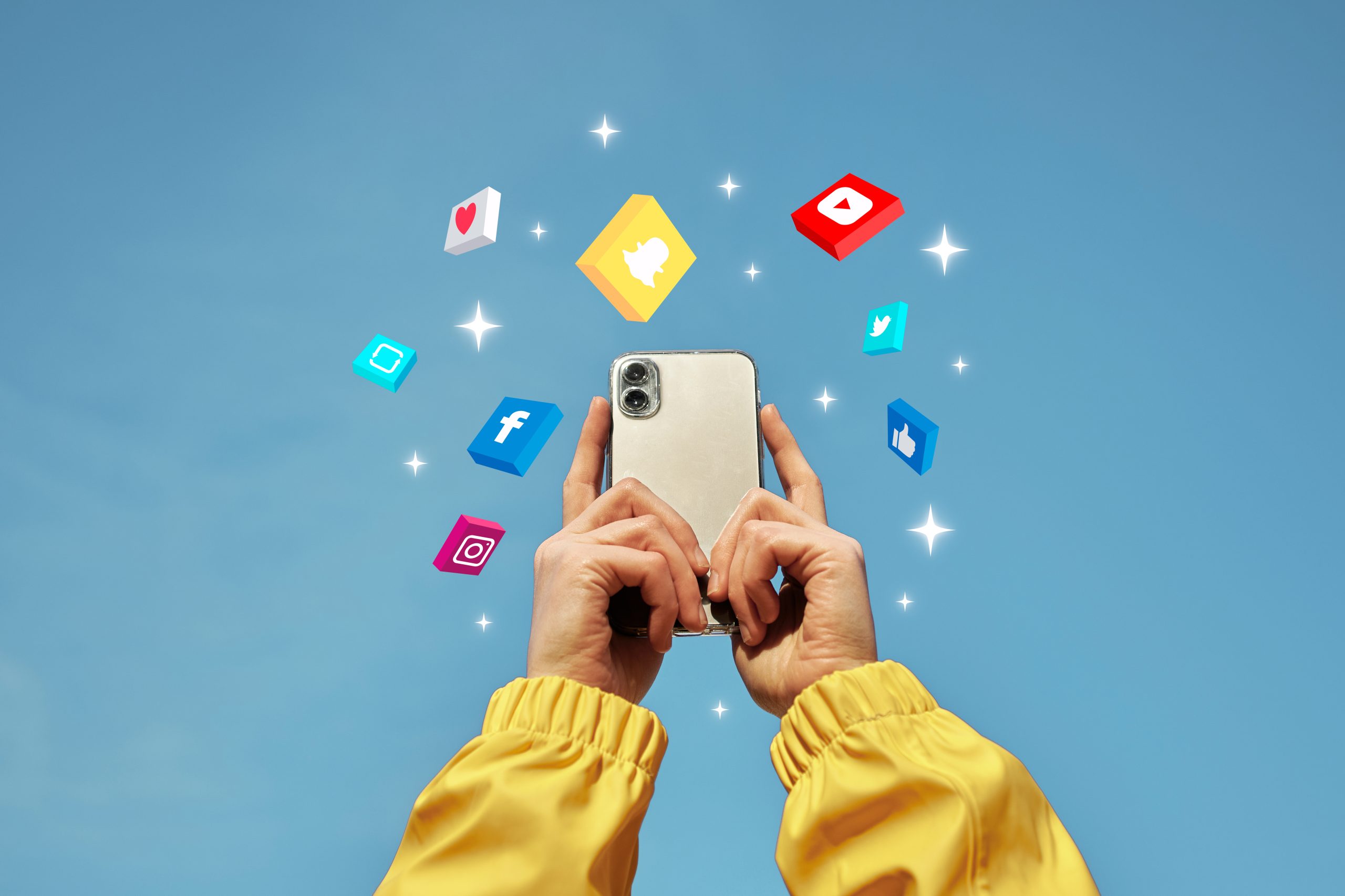Person holding phone surrounded by social media logos