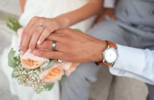 two people with wedding rings