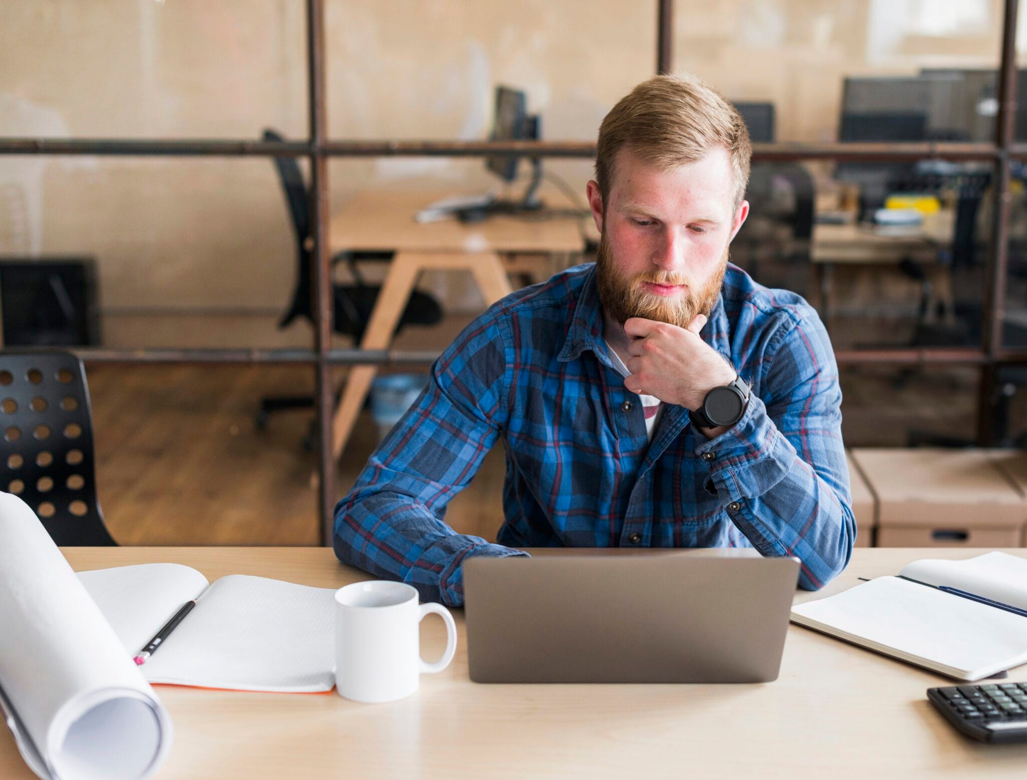 man looking at laptop